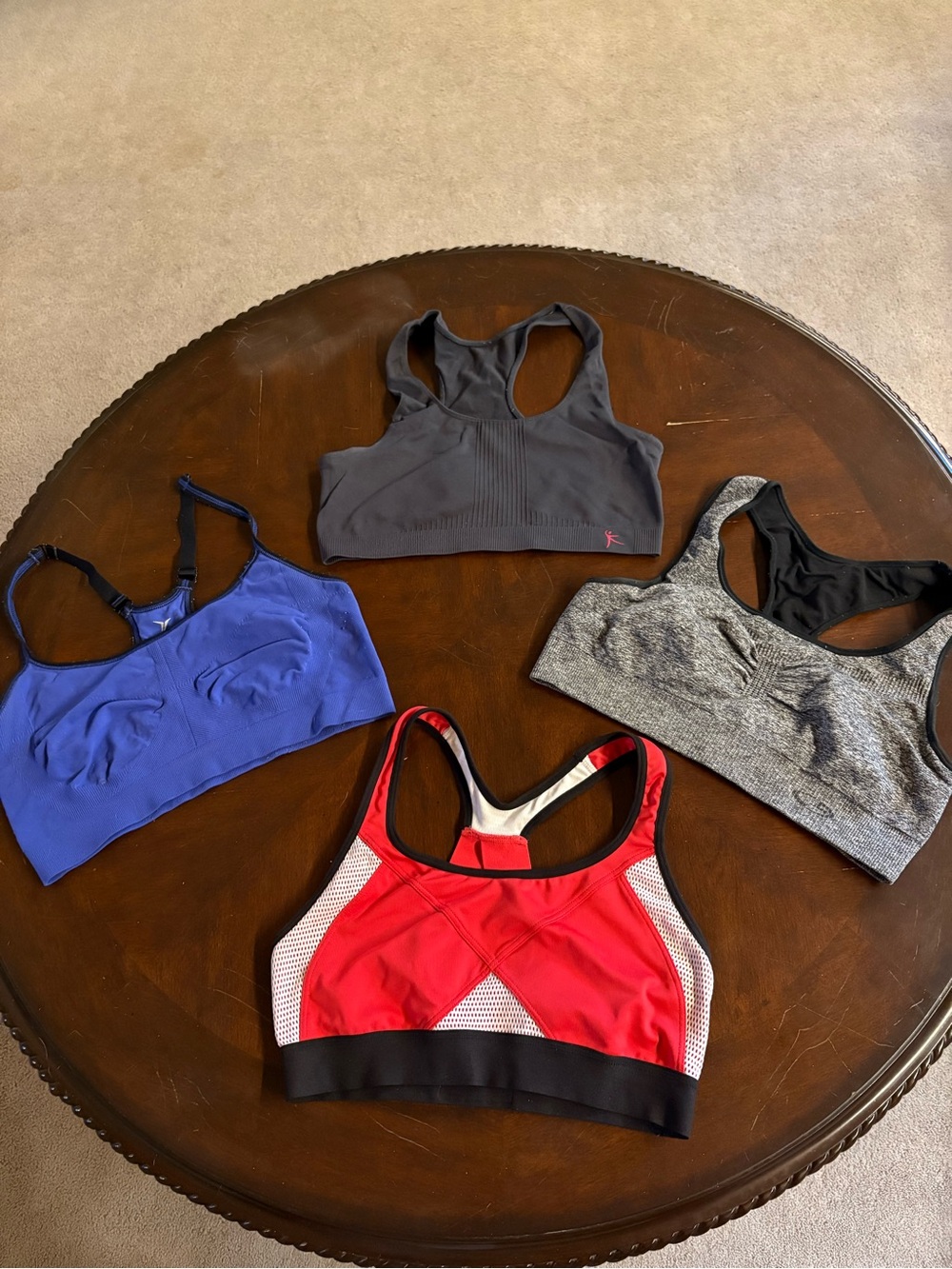 4 Women’s / juniors Sports bras. Sizes medium large champion old navy C9 Danskin